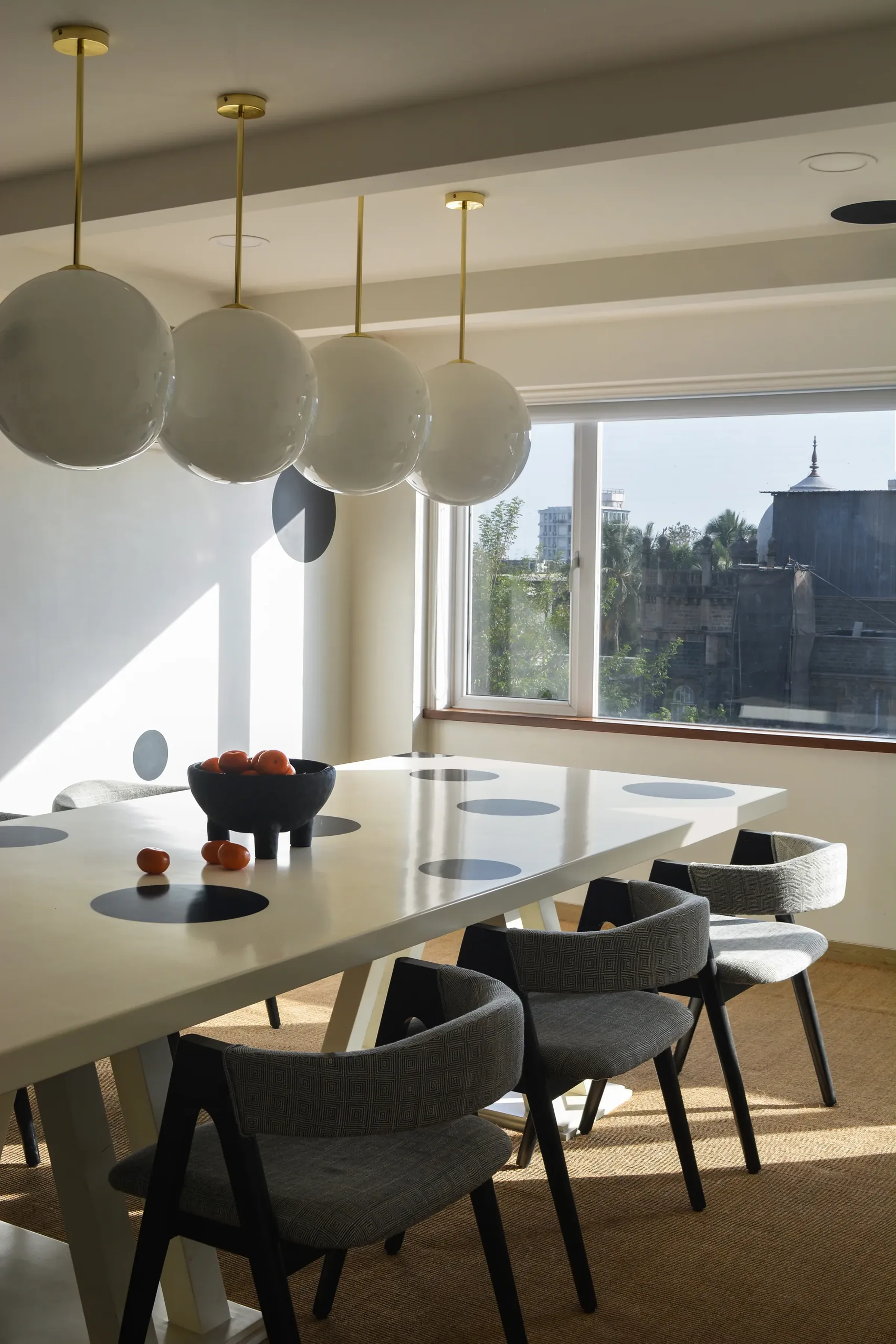 Dining room with globe pendants